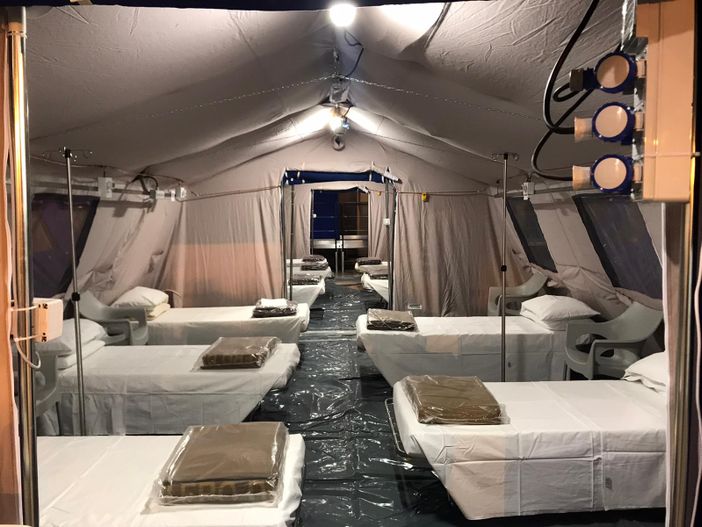 Coronavirus, arrivati i primi pazienti al Padiglione 5 di Torino Esposizioni Coronavirus, arrivati i primi pazienti al Padiglione 5 di Torino Esposizioni