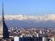 panorama di Torino con montagne innevate e Mole