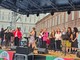 palco con persone in piazza Castello palco con persone in piazza Castello