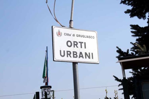 cartello di ingresso degli orti urbani di Grugliasco