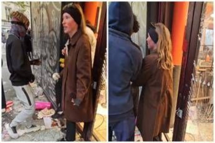 Parigi, donna prova a fermare i saccheggiatori: "Perché lo fate?"